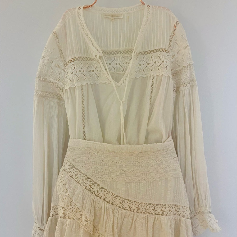 LOVESHACKFANCY Cream Ruffled Smocked Blouse with Long Sleeves .
