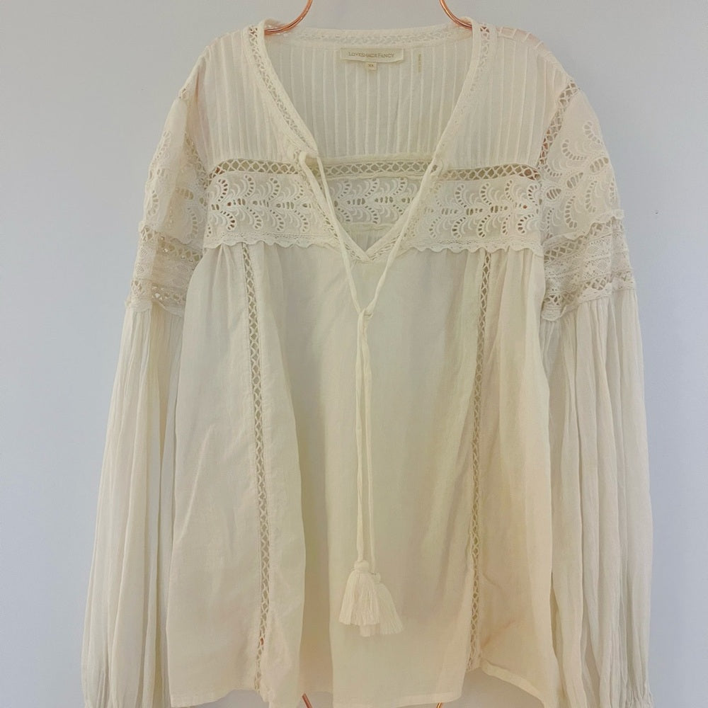 LOVESHACKFANCY Cream Ruffled Smocked Blouse with Long Sleeves .