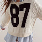 Cropped Cable-Knit 87 Graphic Sweater