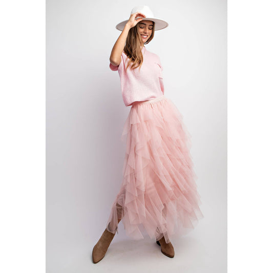 CASCADING TULLE LAYERED SKIRT.