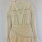 LOVESHACKFANCY Cream Ruffled Smocked Blouse with Long Sleeves .