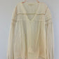 LOVESHACKFANCY Cream Ruffled Smocked Blouse with Long Sleeves .