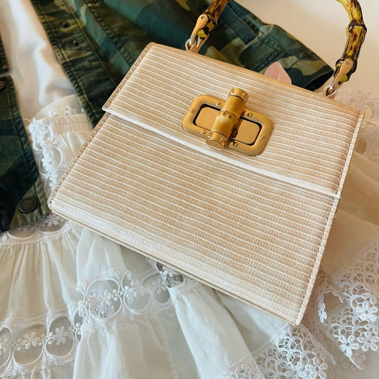 Cream Satchel with Gold Chain Handle and Structured Design