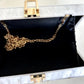 ESTRELLA chic White Clutch with Gold Star Accents
